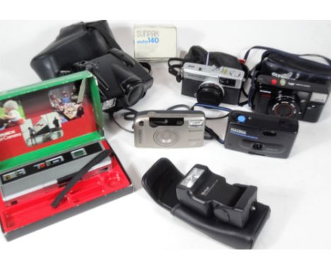 Various cameras and related items, Olympus, Zoom, Olympus Trip 35, 8cm H partially cased, various other etc. (a quantity) 