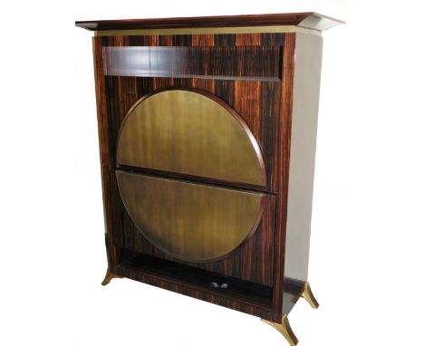 A 1970's Italian Archiutti style bureau desk, of rectangular form with an oval disc front hinging to reveal a fitted interior