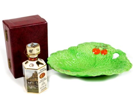 A Gordon Highlander single malt Scotch whisky decanter, sealed in fitted box, 16cm H, and a Beswick ware leaf dish of shaped 