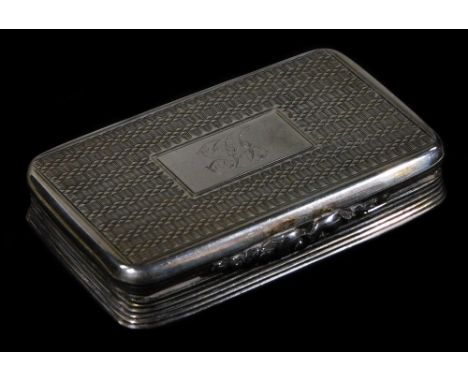 A George IV silver snuff box, of oblong form, partially engine turned with initialled cartouche and silver gilt interior with