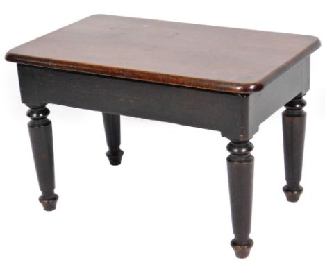 A 19thC mahogany commode, of oblong form, on turned legs, 43cm H, 67cm W, 41cm D.