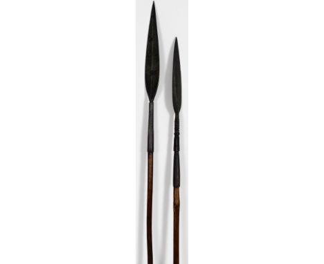 Two African tribal spears, with long handles and metal arrow shaped ends, 160cm L. (2)