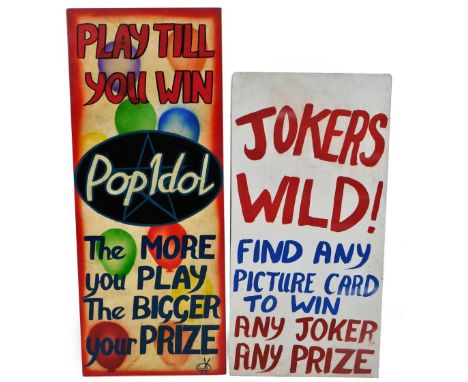 Two circus or fairground wooden signs, Joker's Wild! and M Parkin Play Till You Win Pop Idol, 120cm x 49cm.  (2)