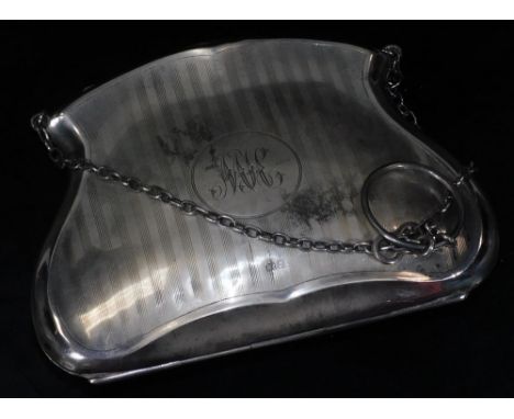 A George V silver evening purse, of shaped form with engine turned body and initialled cartouche with chain handle and fitted