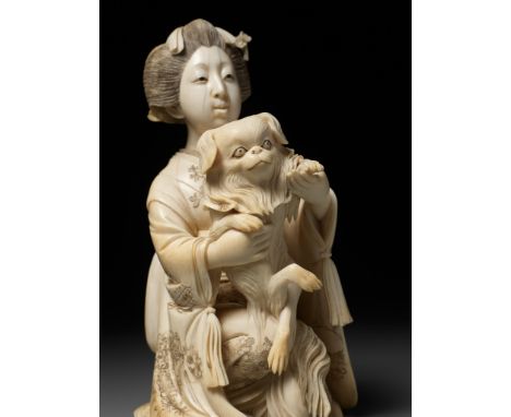 SHIMAMURA SHUNMEI: A SUPERB TOKYO-SCHOOL IVORY OKIMONO OF A BIJIN WITH HER PEKINGESEBy Shimamura Shunmei (Toshiaki, 1853-1896