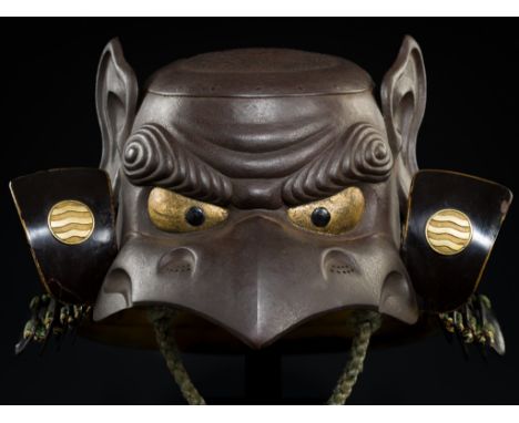 A MYOCHIN STYLE IRON KAWARI KABUTO IN THE FORM OF A TENGUJapan, Meiji period (1868-1912) or laterConstructed of eight plates 