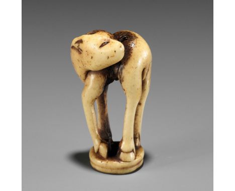 AN ANTLER INGYO (SEAL) NETSUKE OF A STAGUnsignedJapan, 18th century, Edo period (1615-1868)Finely worked from antler bearing 