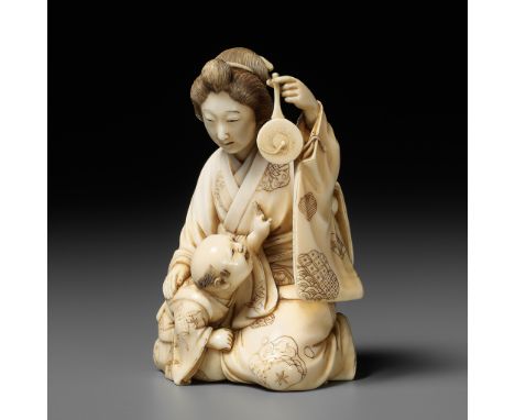 TAIMIN: AN IVORY OKIMONO OF A MOTHER AND CHILDBy Taimin (Yasutami), signed TaiminJapan, Meiji period (1868-1912)The mother sa