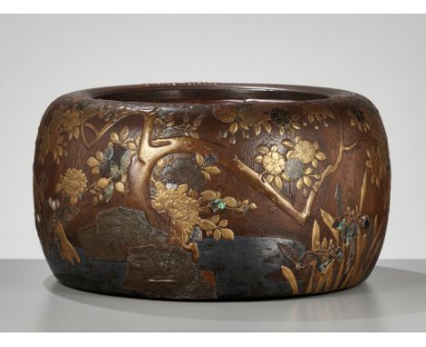 A LARGE RINPA-STYLE LACQUERED PAULOWNIA WOOD HIBACHI (BRAZIER)Japan, late Edo period (1615-1868)The wood ground finely decora