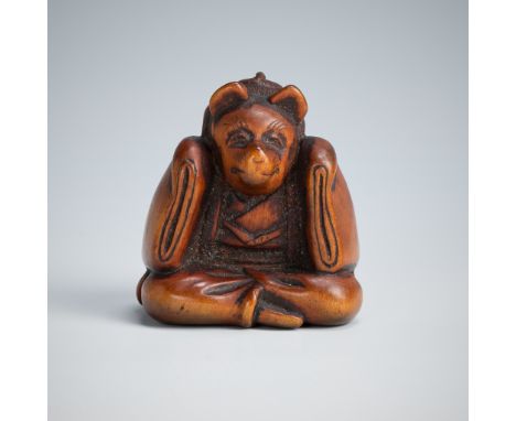 A CHARMING WOOD NETSUKE OF A KARAKO WEARING A KITSUNE MASKUnsignedJapan, mid to late 19th centuryThe boy seated cross-legged,