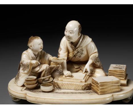 SEISHI: A FINE AND RARE IVORY OKIMONO OF A WOODBLOCK PRINT MAKER WITH HIS SONBy Seishi, signed SeishiJapan, Meiji period (186