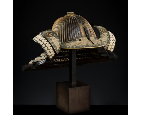AN IRON SUJIBACHI KABUTO WITH HOJO CLAN MONJapan, Edo period (1615-1868)The components laced in white and fitted with gilt-co