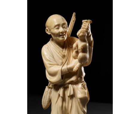 KOSEI: A FINE TOKYO SCHOOL IVORY OKIMONO OF A HUNTER HOLDING A HAREBy Kosei, signed Kosei and kakihanJapan, Tokyo, Meiji peri