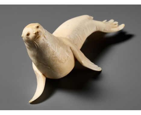 ITASAKA KASON: A VERY RARE IVORY OKIMONO DEPICTING A RECUMBENT SEA LIONBy Itasaka Kason, signed Itasaka Kason kokuJapan, Meij