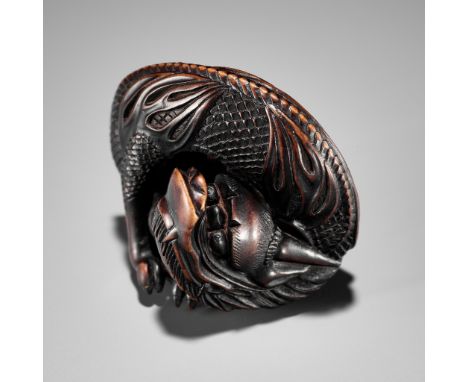 HIDEKAZU: A FINE WOOD NETSUKE OF A DRAGON COILING AROUND A TAMABy Hidekazu, signed HidekazuJapan, 19th century, Edo period (1