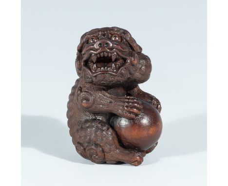 VADYM PYVOVAR: A BOXWOOD NETSUKE OF A SNARLING SHISHIBy Vadym Pyvovar, signed with the artist's initialsUkraine, 2023Boldly c