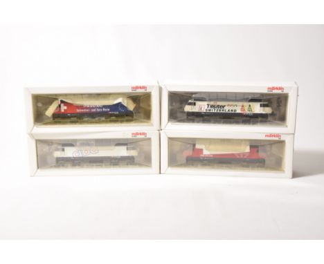 Four boxed Marklin HO gauge electric locomotivesNo. 8360 Serie 460 SBB CFF FFS, 8350 Serie 460 Ciba, 38613 Serie 460 Tilsiter
