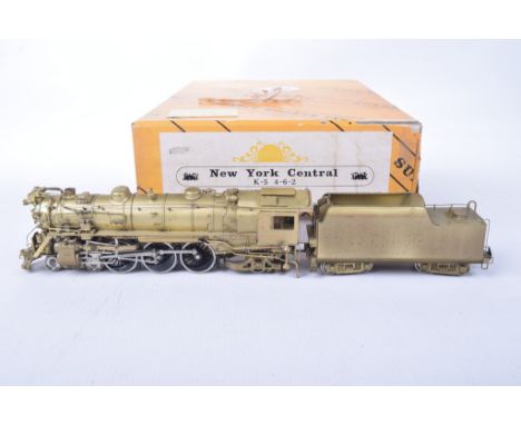 A boxed Sunset Models HO gauge unpainted brass New York Central K-5 4-6-2 locomotive With eight wheel tender.