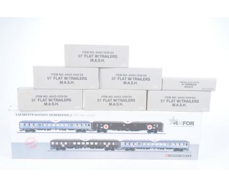 A boxed 4MFOR metal Military Mission by Marklin setNo. 42563 containing four military hospital coaches, six 51ft flat W-trail