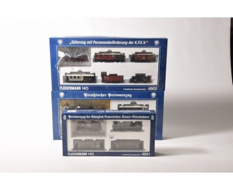 Three boxed Fleischmann HO gauge setsComprising 4901 containing 2-4-0 tank locomotive no. 6058 with two coaches and luggage v