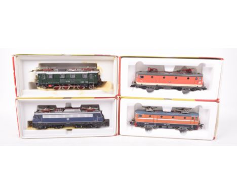 Four boxed Fleischmann HO gauge electric locomotives4335 in dark blue and silver DB livery, 4365 in orange and dark blue live