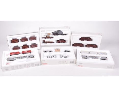 Eight boxed Marklin HO gauge goods sets46370 and 46371 each containing six wagons, 47078-02 and 03 cargo wagons, 46824 cable 