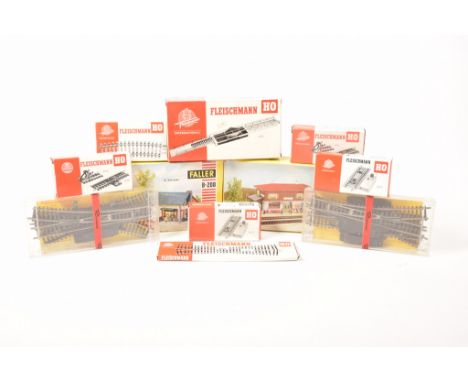 Two boxes containing a large quantity of HO gauge trackMuch of which is in boxes by Fleischmann, Rivarossi, Trix, Lima, Atlas