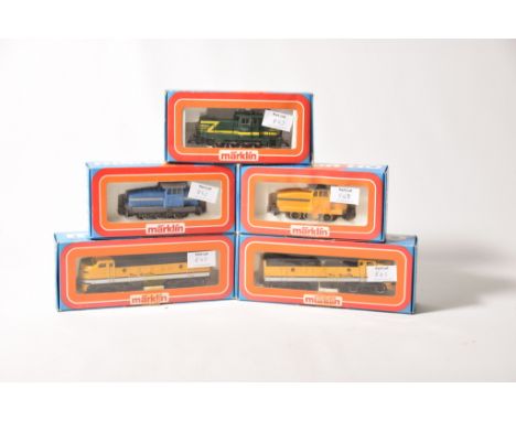 Five boxed Marklin HO gauge diesel locomotivesNo. 3149 shunter no. 8024 in green and yellow FSR livery, 3078 shunter in blue 