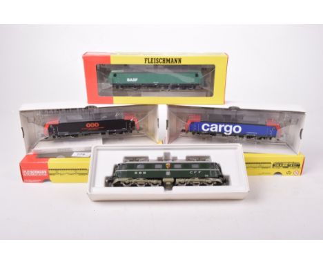 Four boxed Fleischmann HO gauge electric locomotives864322 in black and red TCS livery, 1334 in dark green SBB CFF livery, 43