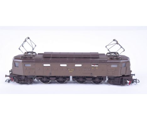 An early unboxed metal Fleischmann HO gauge electric locomotiveIn brown livery.