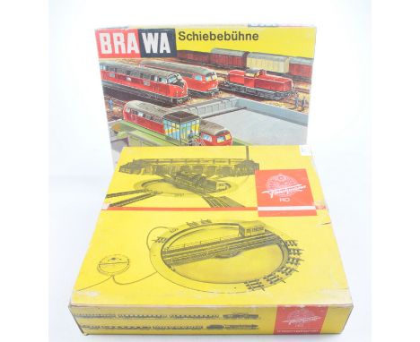 A boxed Fleischmann HO gauge turntableNo. 1780 6018 and a boxed Brawa Schiebebuhne no. 1180.