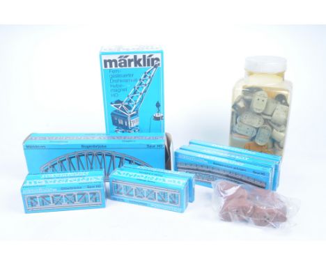 A quantity of Marklin HO gauge accessoriesIncluding remote controlled slewing crane with lifting magnet no. 7051, bridge sect