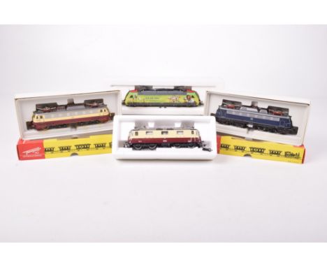 Four boxed Fleischmann HO gauge electric locomotives 864355 in green FIFA WM 2006 livery, 4336 in maroon and cream DB livery,