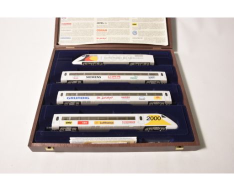 A boxed Fleischmann HO gauge Special Train Set for The Millennium Containing four piece electric set with locomotive, two coa