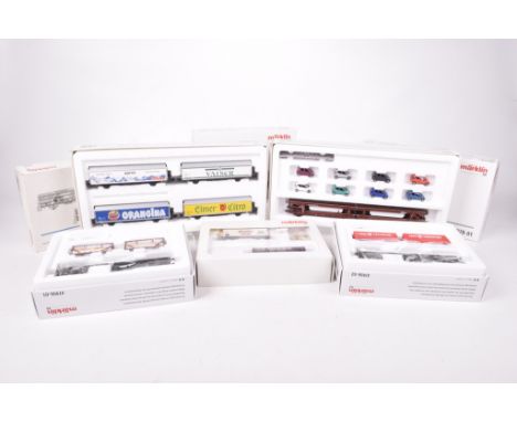 Eight boxed Marklin HO gauge goods setsComprising 94037 beer wagon set, 4838 hose wagons, 47453-03 container wagon, 47078-01 