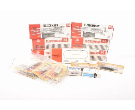 A box containing a large quantity of HO gauge accessoriesIncluding track, much of which is boxed by Roco, Fleischmann etc.