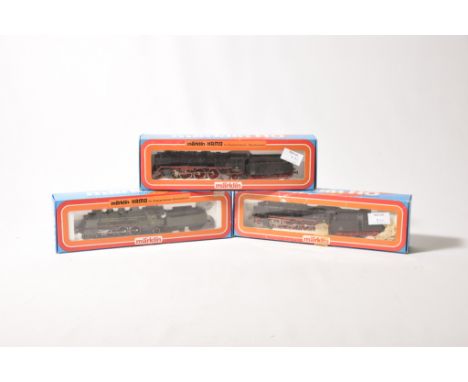 Three boxed Marklin Hamo locomotives and tenders No. 8383 4-6-2 locomotive with eight wheel tender in green ETA livery, 8385 
