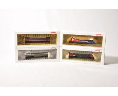 A boxed Marklin electric locomotive 38611 Serie 460 Miele and three boxed diesel locomotives 3067 MY1100 DSB, 34662 MJ1100 DS