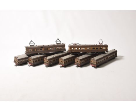 Two early metal Rivrossi HO gauge electric locomotivesTogether with six coaches in dark and light brown Continental livery.