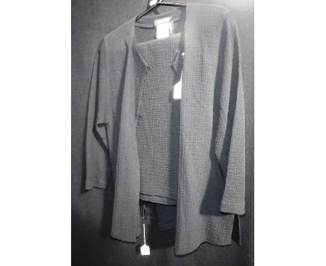 JEAN MUIR: A BLACK SILK JACKET AND TROUSERS with bugle button detail to jacket, circa 1970