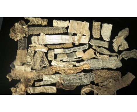 A COLLECTION OF MIXED LACE EDGINGS AND PIECES, to include a 19th century lace stock, a tie belt possibly 17th century and exa