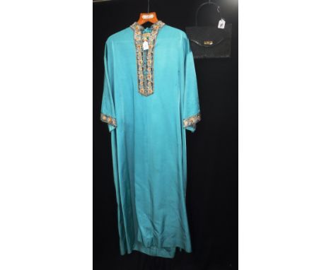 A CHRISTIAN DIOR BOUTIQUE DRESS and a Gucci evening bag