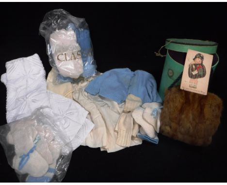 A VINTAGE CHILD'S FUR MUFFLER in its original green cardboard box, together with a collection of vintage children's knitted b