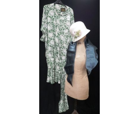 DROOPY & BROWN BY ANGELA HOLMES: CIRCA 1980'S TWO PIECE GREEN AND WHITE ENSEMBLE, with skirt and matching blouse with ties to