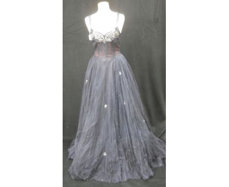 A VINTAGE LADIES MIDNIGHT BLUE NET EVENING DRESS, the body covered with silver coloured sequined beads depicting flowers, fal