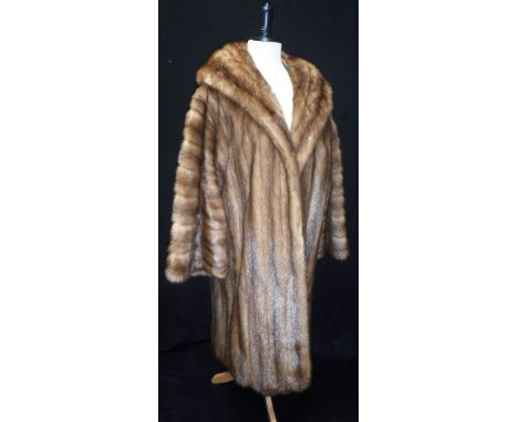 GRIFFIN & SPALDING, FURRIERS, NOTTINGHAM: A VINTAGE FUR COAT 