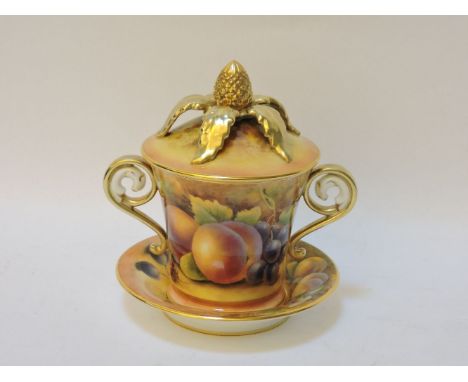 A Royal Worcester porcelain custard cup, cover and saucer, the cover with pineapple knop and all decorated with hand painted 