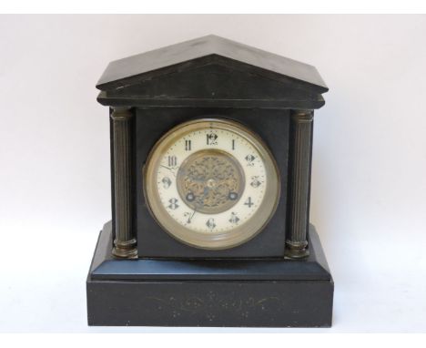 A slate mantel clock, 20cm wide