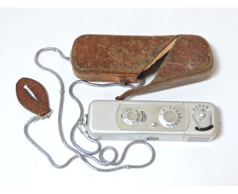 A Minox spy camera, in leather case, with original chain