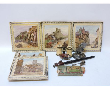 Five Victorian pottery tiles, possibly Minton, a silver inkwell, a pair of opera glasses, a baby's rattle, and a pipe